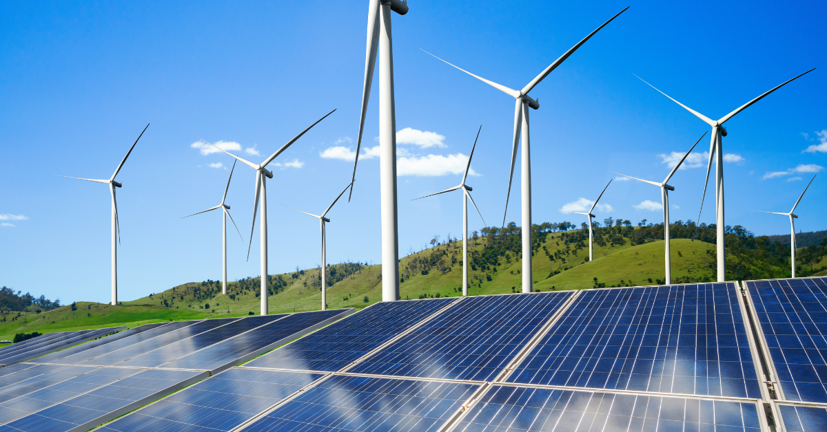 Wind turbines and solar farm infrastructure selected by an in-house renewable energy site selection team.